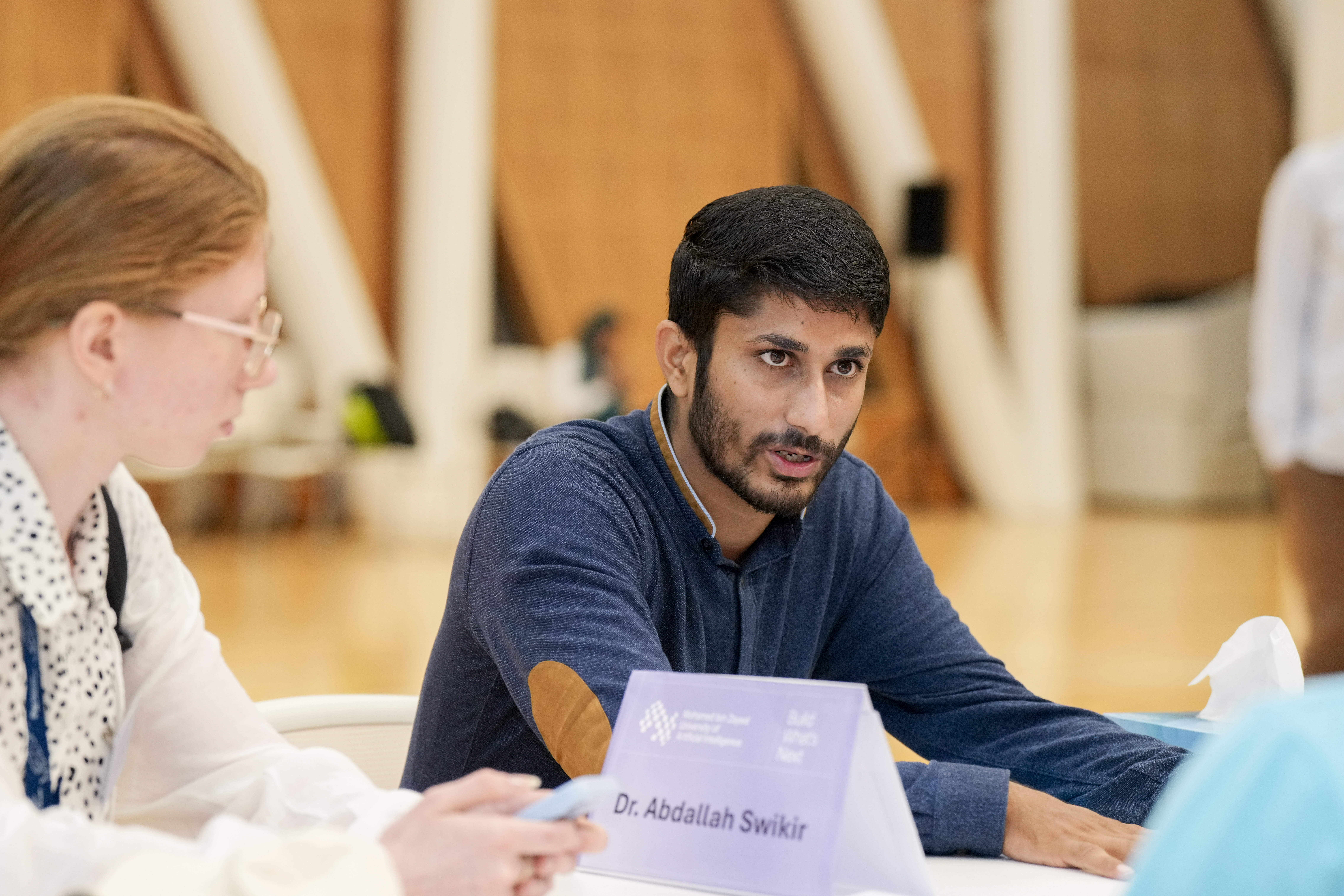 UGRIP students receiving mentoring in the AIRoCS lab